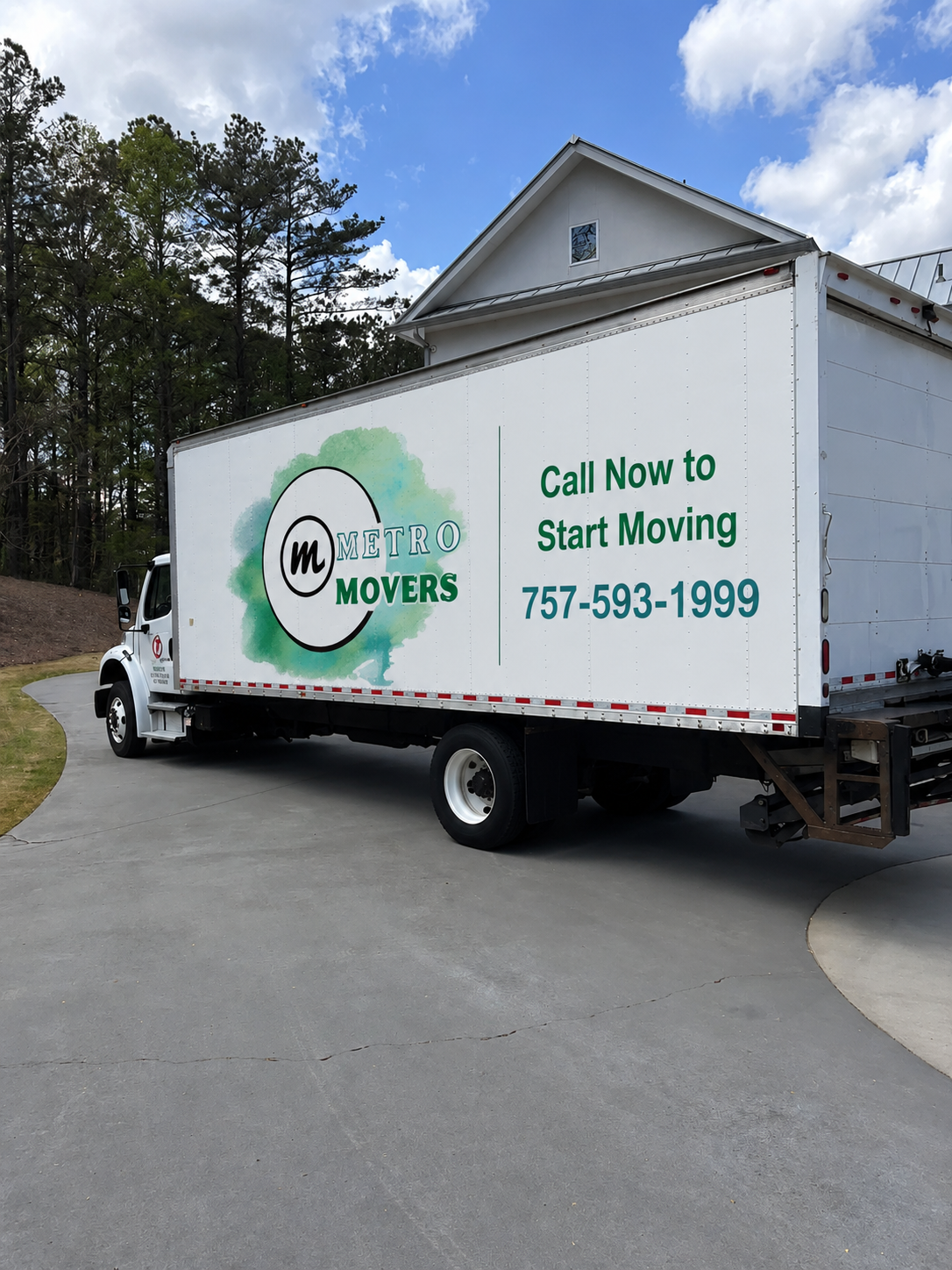 Metro Movers ATL truck with phone number and logo