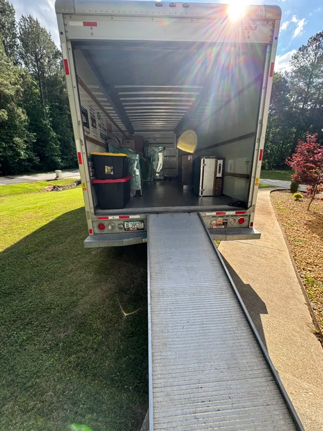 Loaded Metro Movers ATL moving truck with ramp ready